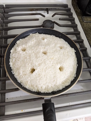 rice with holes poked